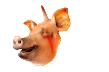Naklejka premium Boiled pig's head isolated on white background