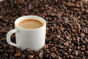 cup of coffee with crema espresso on background coffee