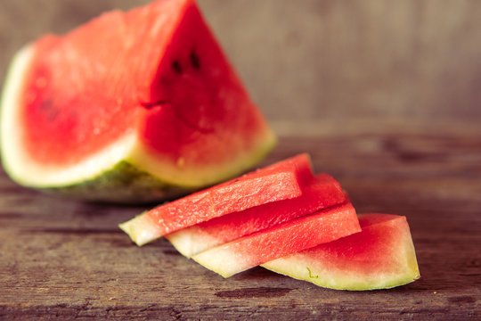 Watermelon on the wooden background. Organic watermelon