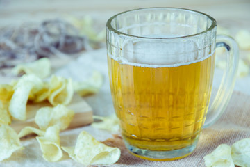 Beer and chips on the table. Octoberfest theme