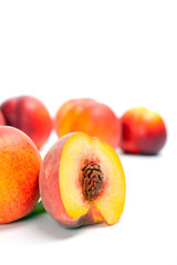 Ripe peach (nectarine)  isolated on white background