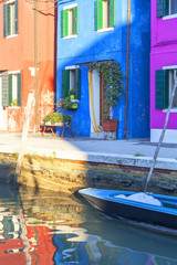 Fototapeta na wymiar Colorful small, brightly painted houses on the island of Burano, Venice, Italy