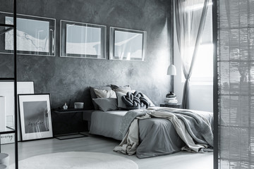 Grey dark bedroom with screen