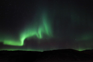 Fototapeta na wymiar The Northern Lights (Aurora borealis) over Jokulsarlon in Iceland