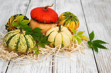 Pumpkins with autumn leaves