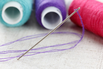 Lien fabric with needle and thread