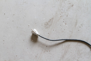 plug from power tools on concrete floor