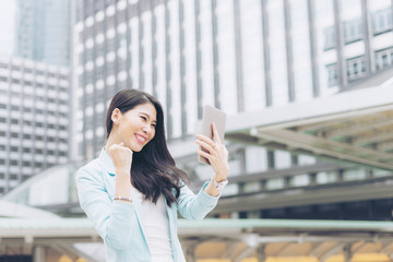 lifestyle business woman feel happy using smartphone