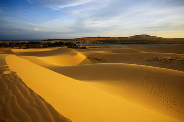 Naklejka na ściany i meble Sand mountains in the desert