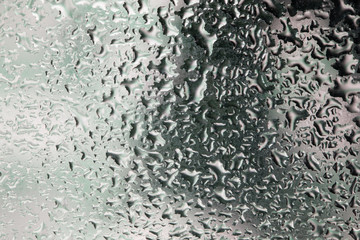 Drops of rain on a window glass. Color