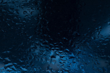 Drops of rain on a window glass. Color