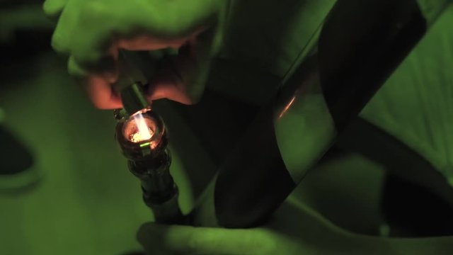 Smoking medical marijuana through the bong close-up .Medical marijuana, weed, pot  and legalization around the world