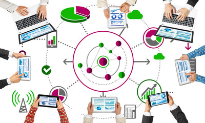 Top view of businesspeople sitting at table and using gadgets