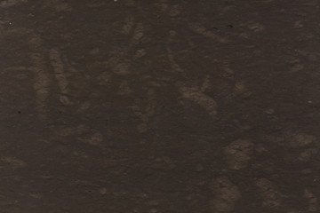 Dark brown marble texture background.