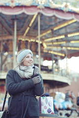 happy woman buys gifts for the new year
