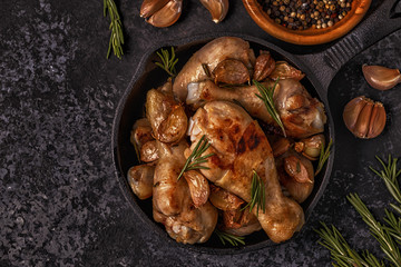Fried chicken legs with rosemary, garlic and chilli.