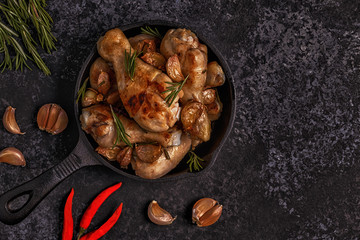 Fried chicken legs with rosemary, garlic and chilli.