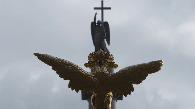 Time-Lapse of the sculpture of golden two-headed eagle and the angel on the Alexander Column on the Palace Square - St Petersburg, Russia