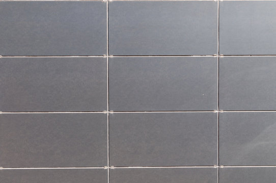 wall of grey ceramic tiles