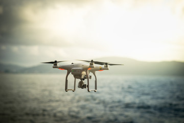 Drone flying on sea