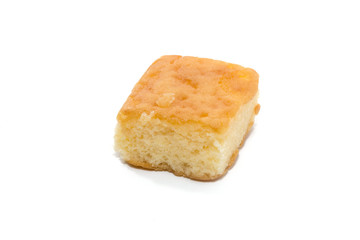 a piece of chiffon cake on white background
