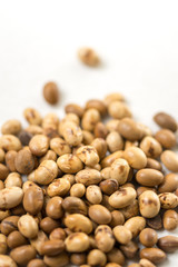 Selective focus on soya beans on the white marble background table