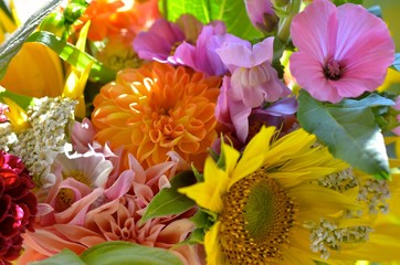 Colorful summer flowers bouquet detail photo. Abstract decorative background photo