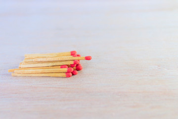 match stalk with red head concept energy old vintage on wooden floor background with copy space add text  ( high definition image )