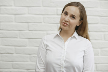 Cheerful winks young adult girl