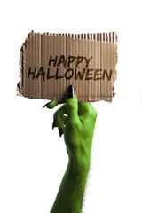 Happy Halloween. green witches or zombie monster hand holding a card sign © ink drop