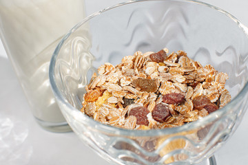 a glass of milk and a portion of oatmeal, close-up of a shot