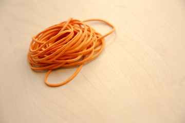 Closeup, Rubber band on the wooden table