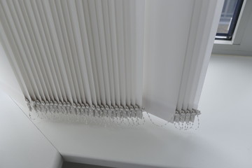 detail of a white blinder in an office