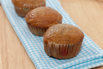 banana cupcake on wooden plate