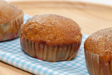 banana cupcake on wooden plate