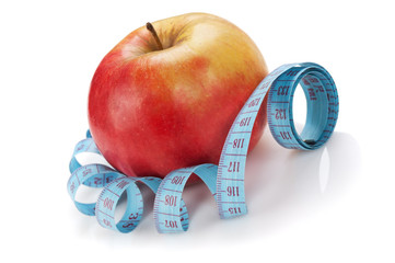 blue measure tape and red apple  isolated