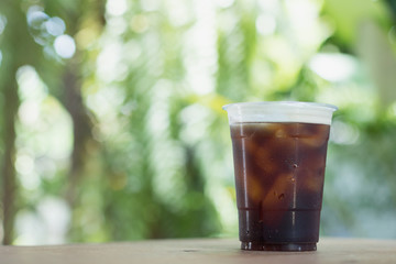 Sparkling Nitro Cold Brew Coffee in plastic glass ready to drink