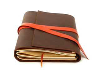 One leather cover notebook isolated on white