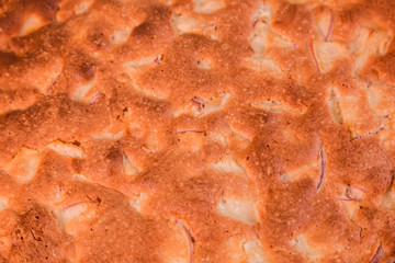 Apple pie with a brown crispy crust.