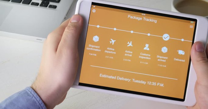 Man tracks his package using digital tablet application