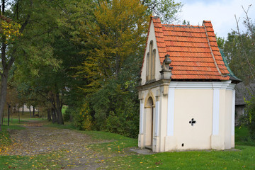 Small white chapel in the woods in Poland