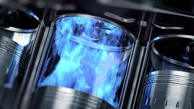 A close-up of engine in slow motion with a blue explosions of fuel