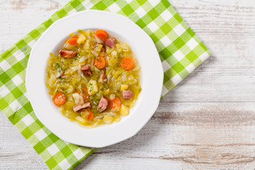 Homemade cabbage soup, cooked on smoked ribs.