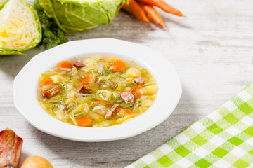 Homemade cabbage soup, cooked on smoked ribs.