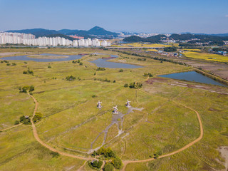 Aerial view of wooden windmill at Incheon Sohrae Ecological Park, South Korea