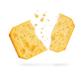 stack of square crackers isolated on white background. Dry cracker cookies isolated