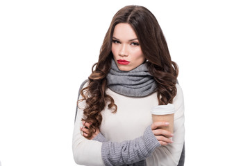 woman in arm warmers holding cup