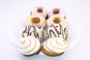 Set of different delicious cakes on white background