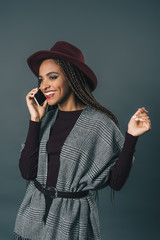 stylish african american girl with smartphone