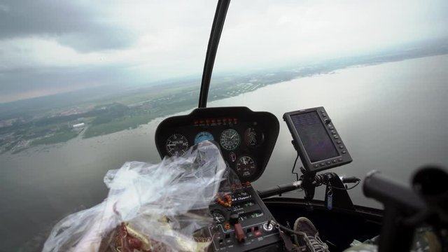 Flying in helicopter over the sea